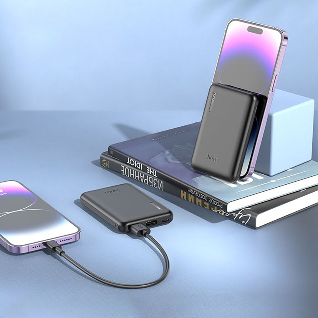 HOCO 5000 mAh Power Bank. Fast Charge. 18.5Wh. Output, two USB A ports. Input, USB-C & Micro USB. J115. iPhone, Android, Tablet, iPad. Black.
